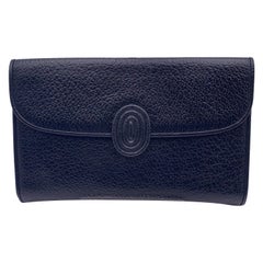 Yves Saint Laurent Vintage - Pochette à rabat en cuir grainé noir