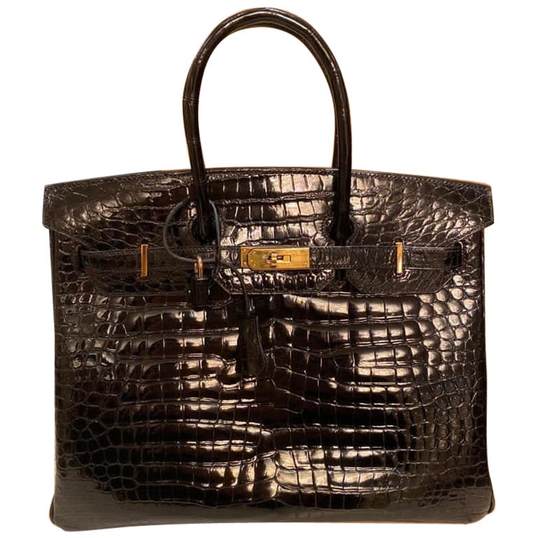 Hermes Birkin 35 Tasche aus schwarzem Porosus Krokodil mit Goldbeschlägen im Angebot