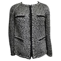Chanel Schwarze Tweed-Jacke mit geflochtener Verzierung