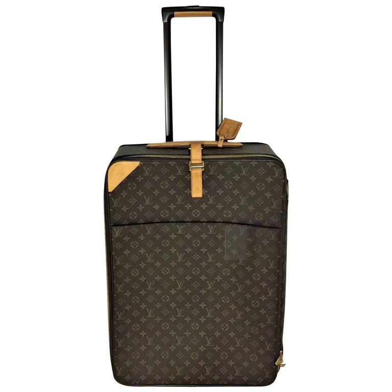 Louis Vuitton Pegase 65 monogram rolling suitcase. at 1stDibs