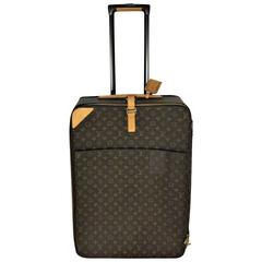 Louis Vuitton Pegase 65 monogram rolling suitcase.