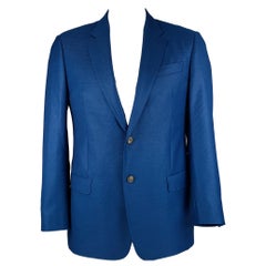 EMPORIO ARMANI - Manteau de sport bleu à têtes de clous en laine à revers clouté, taille 42