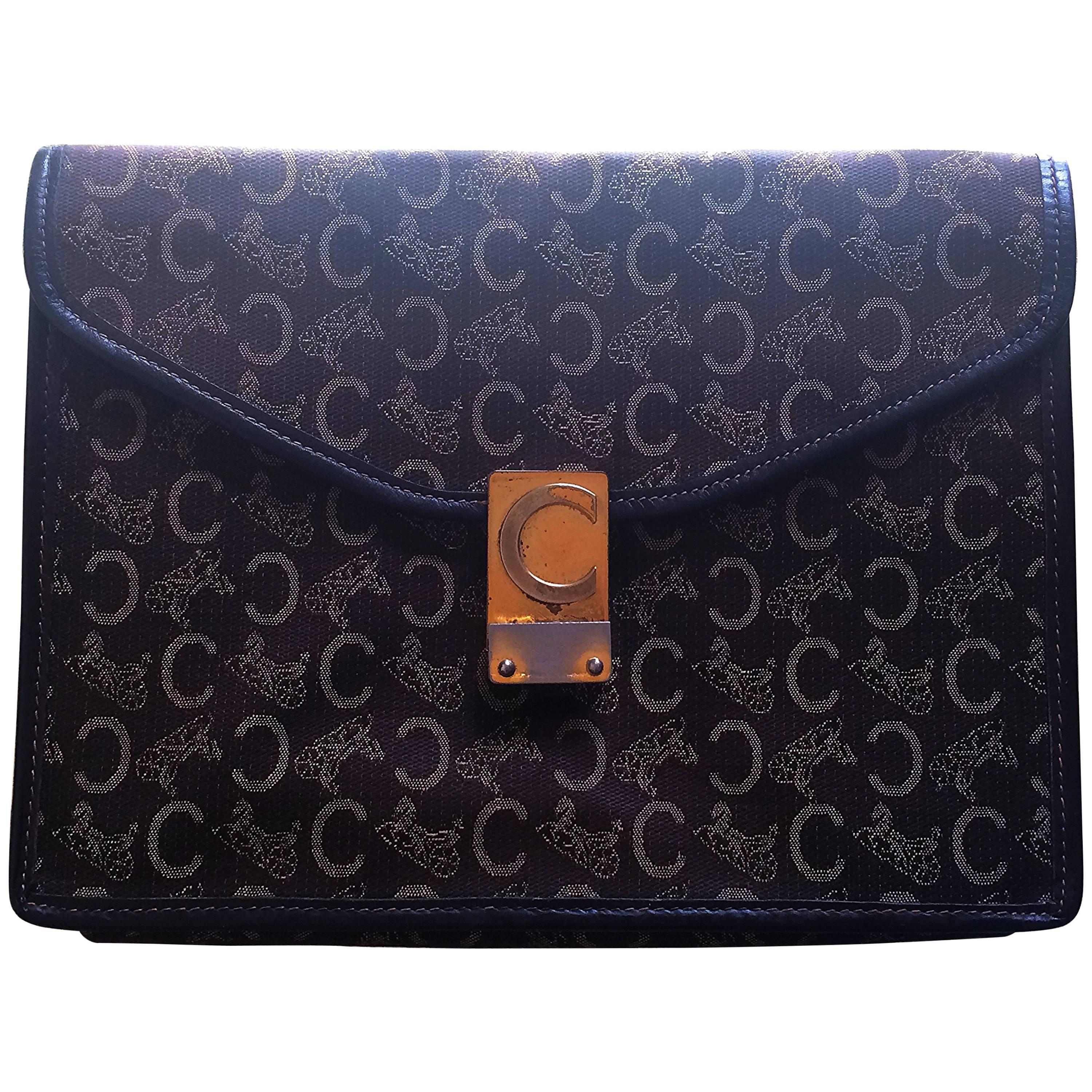 Vintage CELINE dark brown logo carriage jacquard clutch bag with leather pipings