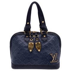 Bolso Louis Vuitton Azul Monograma Cuero Neo Alma Doble Jeu