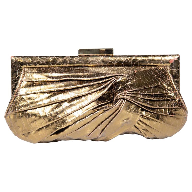 Anya Hindmarch Gold Cracked Leather Knot Clutch For Sale
