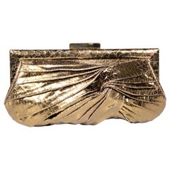 Anya Hindmarch Gold Cracked Leather Knot Clutch