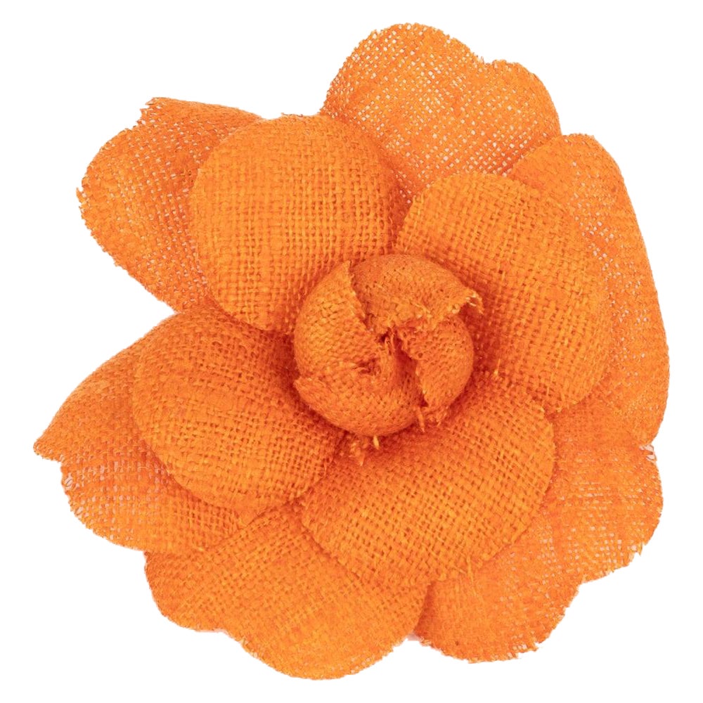 Chanel Orange Camellia Brooch