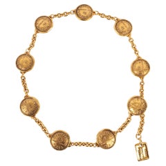 Chanel, ceinture de chaînes et médaillons représentant des pièces de monnaie, années 1980