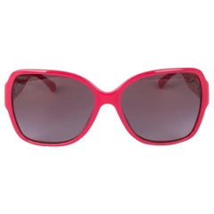 Lunettes de soleil Chanel rose avec logos CC