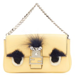 FENDI Micro Baguette buttergelbe schwarze Pelz-Augen-Ledertasche mit Griff oben