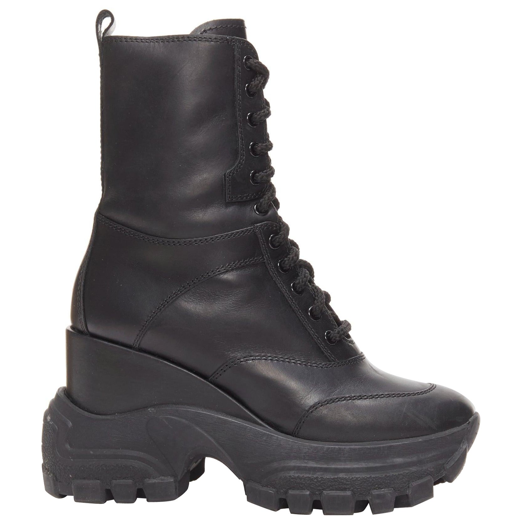 MIU MIU Runway bottes militaires à talons compensés en cuir noir avec logo, EU39 en vente