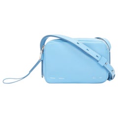 PROENZA SCHOULER White Label Sac à bandoulière pour appareil photo en cuir bleu avec fermeture éclair argentée