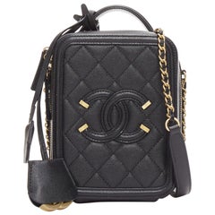 Chanel N.S.A. Vanity Vertical noir filigrane or logo CC petit sac à bandoulière