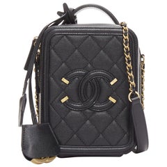 CHANEL N/S Vanity Vertical black filigree gold CC logo small crossbody bag