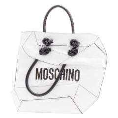 MOSCHINO COUTURE weiße optische 2D flache Shopping Tote Leder-Clutch Bag