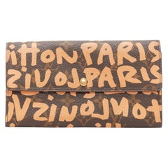 LOUIS VUITTON Portefeuille long monogramme orange graffiti marron Stephen Sprouse