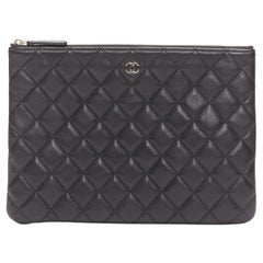 CHANEL O Case black smooth leather matelasse quilted zip clutch bag