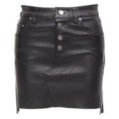 AMIRI mini-jupe noire en cuir véritable à poches hautes et basses au dos taille US0 XS