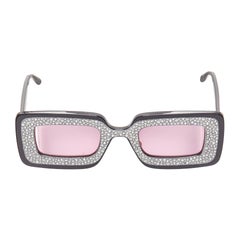 GUCCI GG0974S Rechteckige Sonnenbrille mit silbernem Kristallrahmen und rosa Linsen