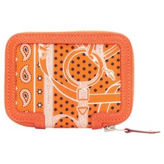 HERMES Soie Cool Portefeuille zippé en cuir de soie imprimé paisley orange