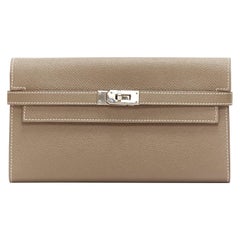 HERMES Kelly Longue taupe togo leather silver turnlock flap long wallet