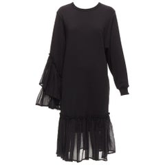 DRIES VAN NOTEN robe sweat-shirt en coton noir à manches asymétriques et ourlet volanté S