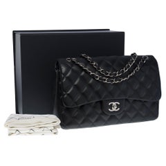 Used Chanel Timeless Jumbo double flap shoulder bag in black quilted lambskin , SHW