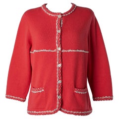 Used Red-orangy cashmere cardigan with branded buttons Chanel 