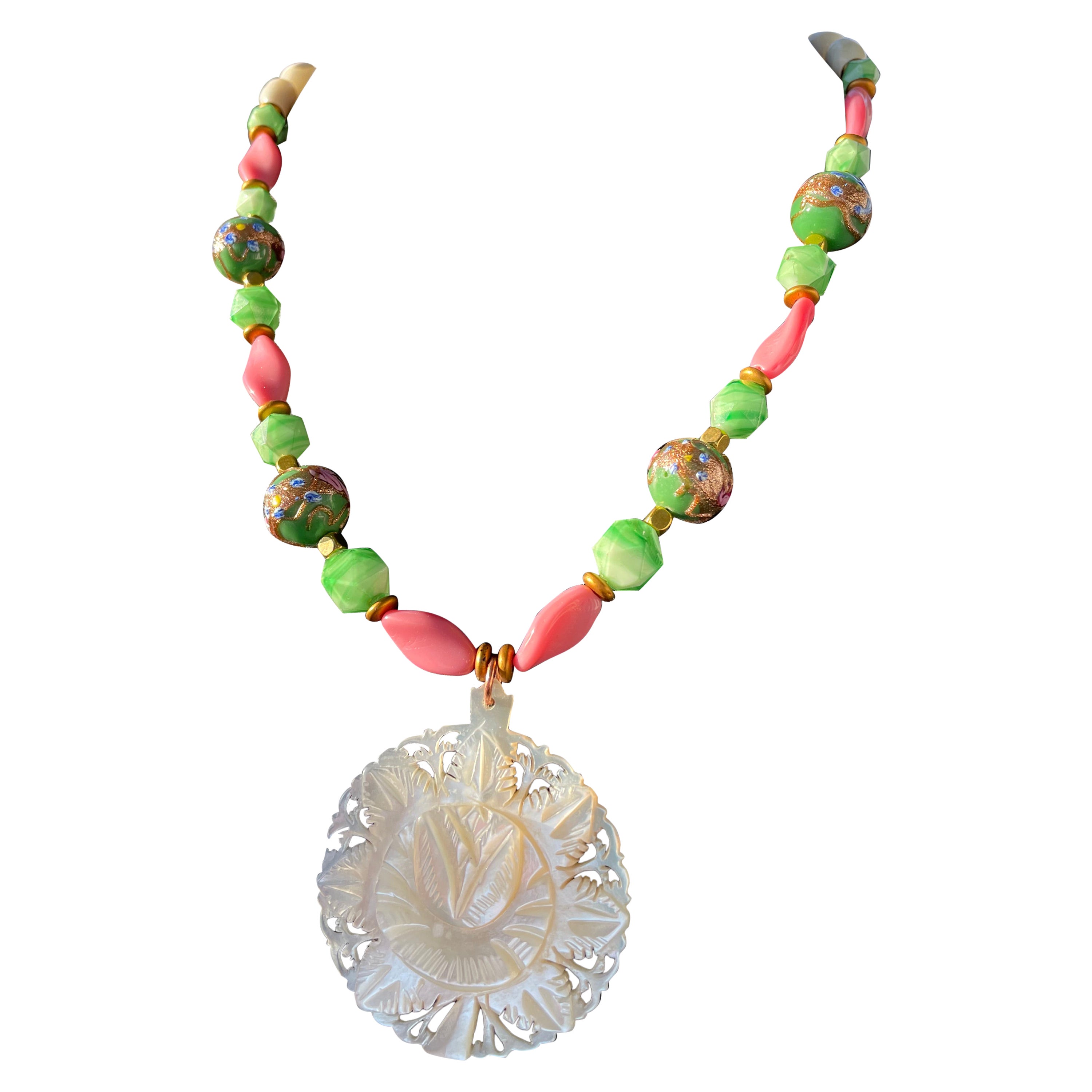 LB offers Vintage Carved Mother of Pearl medallion necklace with vintage glass For Sale