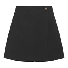 Jupe-short noire à boutons CD de Christian Dior 