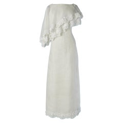 Organdy wedding dress with asymmetrical cape with embroideries Circa 1960's/70's
