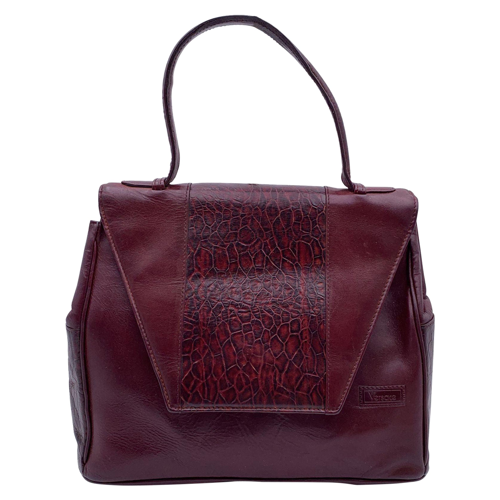 Gianni Versace Vintage Burgundy Embossed Leather Handbag Satchel For Sale