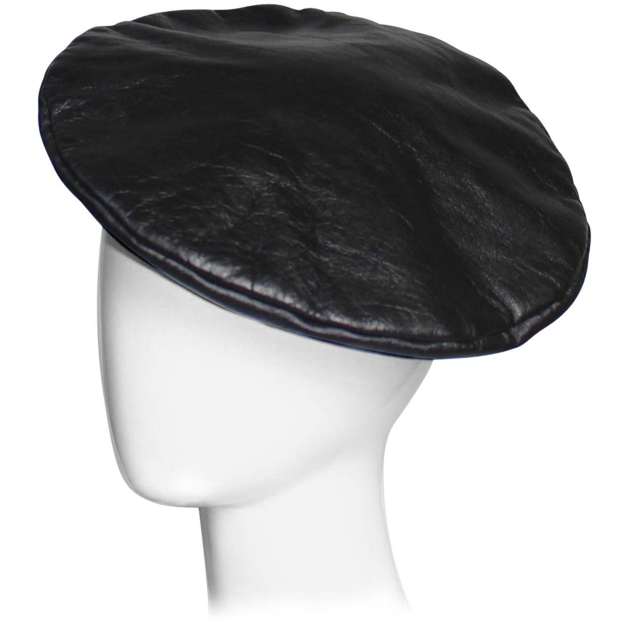Yves Saint Laurent was a master at envisioning the high-fashion potential in that which others might have dismissed as common, whether that was the suit, the safari jacket or the peasant dress. This beret is no exception. He made the French working
