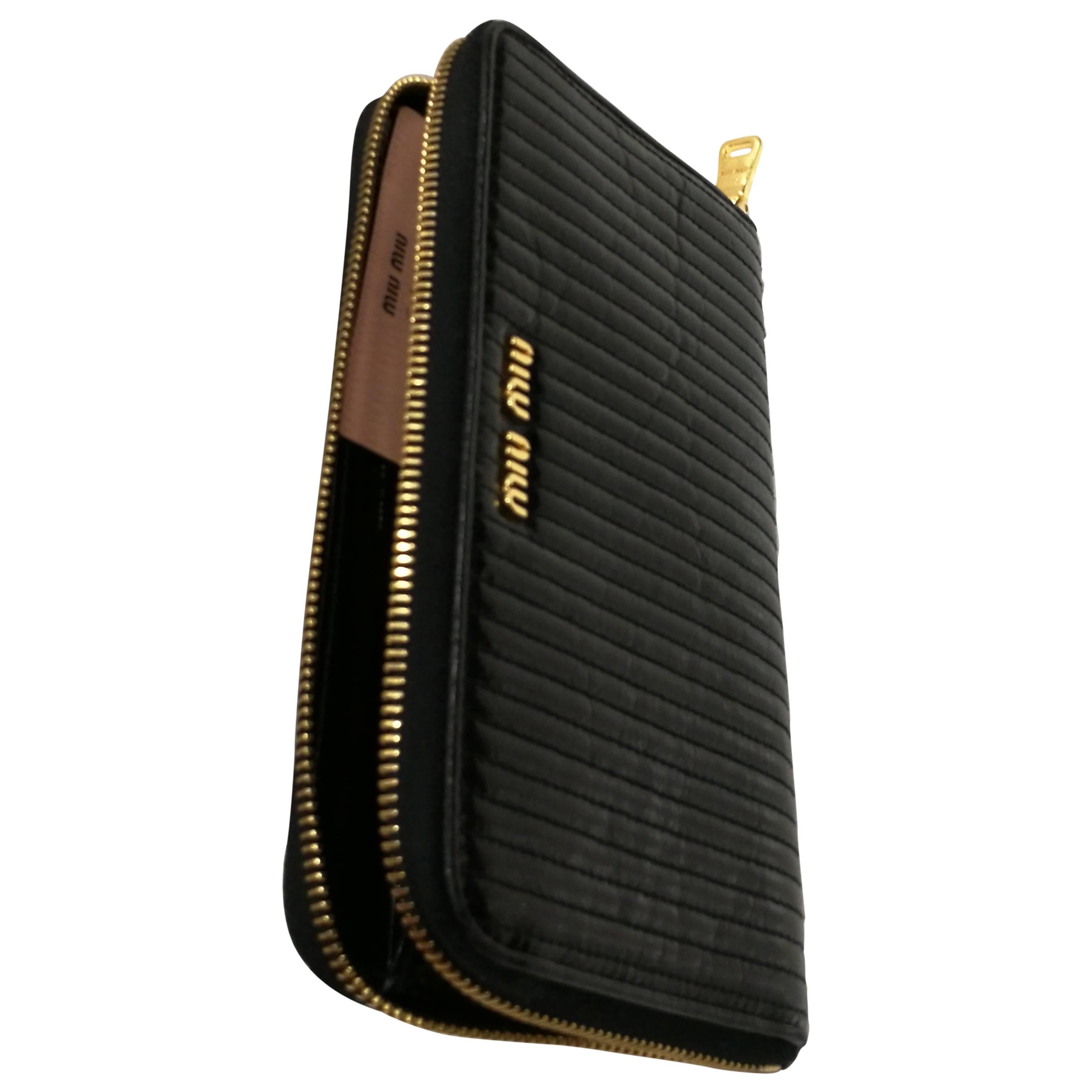 Miu Miu black wallet gold tone hardware