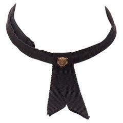 GUCCI Alessandro Michele gargantilla de cinta negra con cabeza de león en oro envejecido