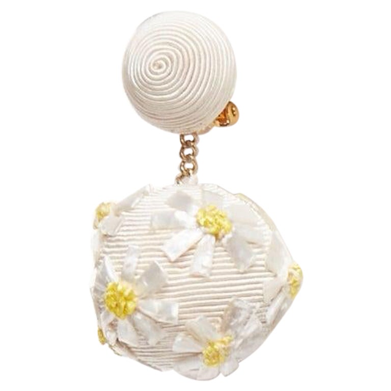 REBECCA DE RAVENEL cream yellow daisy applique clip on drop earrings For Sale