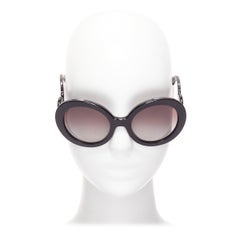 PRADA SPR27N black swirl temple logo round oversized sunglasses