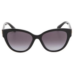 Lunettes de soleil Chanel à verres dégradés et papillon noir