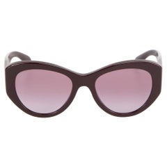 Lunettes de soleil Chanel à monture papillon violette