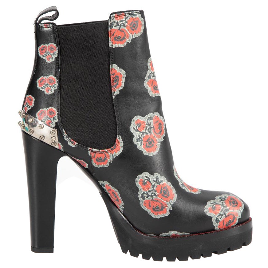 Alexander McQueen - Bottes en cuir noir à motif floral clouté - Taille IT 39 en vente