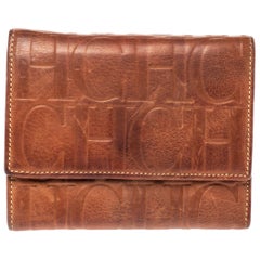 Carolina Herrera Portefeuille compact trifold en cuir gaufré Brown