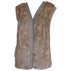 sleeveless mink fur vest trimmed with leather 12