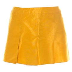 Mini-jupe plissée en taffetas jaune Miu S