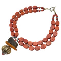 Used Oragenal Coral Necklace with Stone Lion Pendant