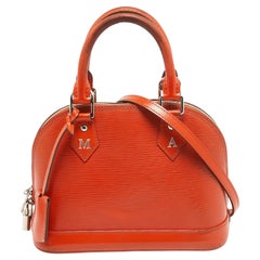 Used Louis Vuitton Piment Epi Leather Alma BB Bag
