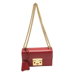 Bolso de hombro pequeño con candado de piel roja de Gucci