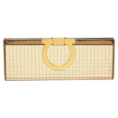 Salvatore Ferragamo Gold Acrylic and Leather Musa Gancini Clutch