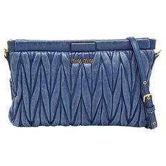 Used Miu Miu Blue Matelassé Leather Frame Clutch Bag