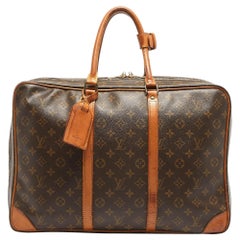 Valise Sirius 45 à monogrammes Louis Vuitton