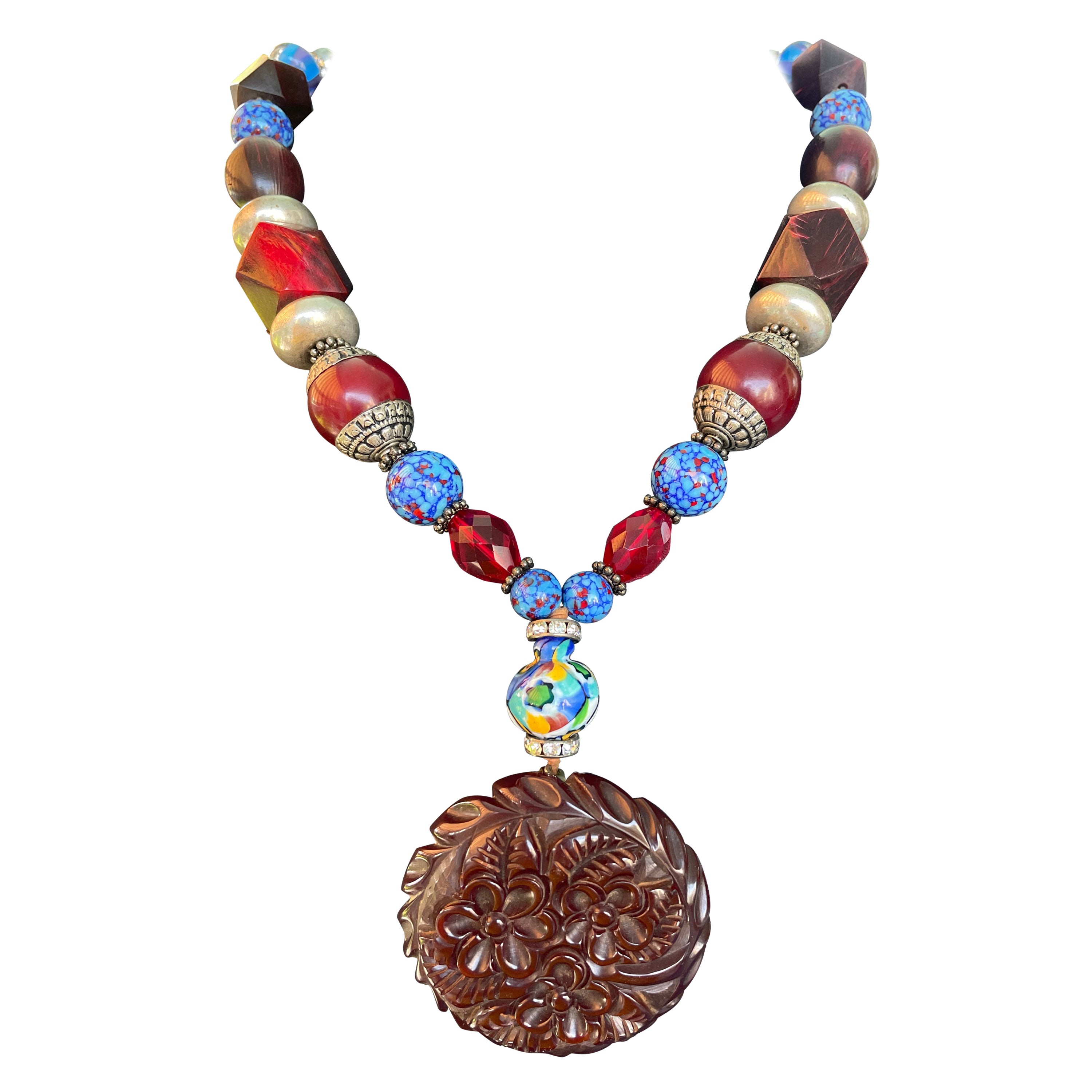 LB offers French Bakelite Carved Pendant Venetian glass Tibetan Wood necklace For Sale